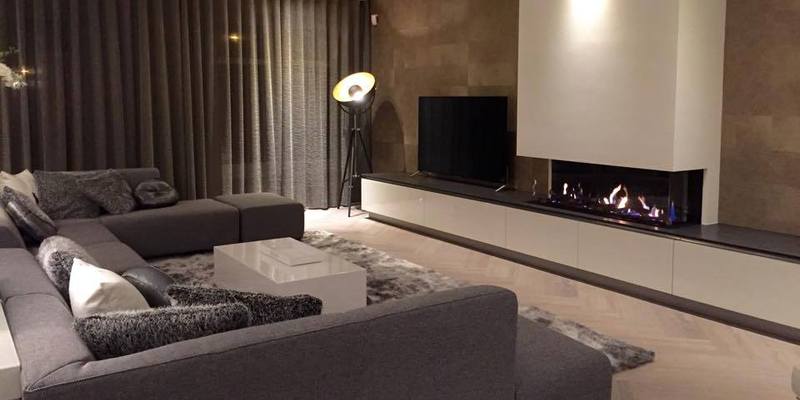 Sfeervolle gashaard in moderne woonomgeving | kachels.nl Sfeervolle gashaard in moderne woonomgeving | kachels.nl