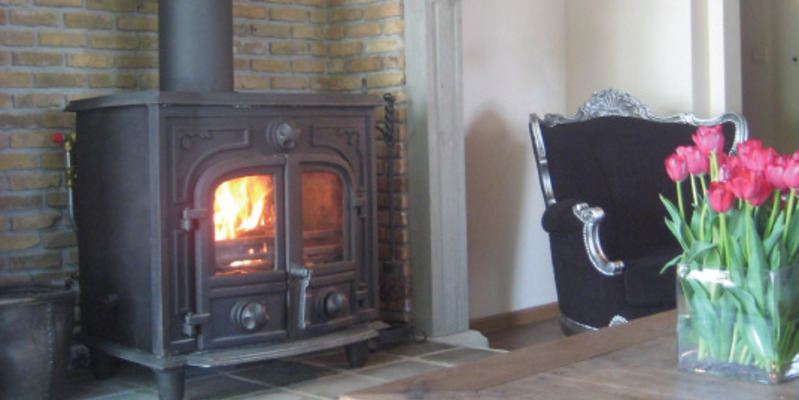 woonkamer modern vierkant stevig & rustiek front schouw steen hout inzet 