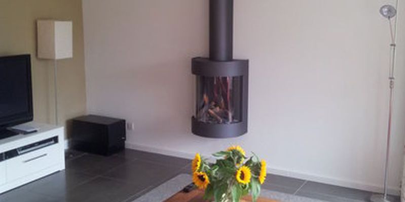 woonkamer modern front licht & sprankelend gas hangend donkergrijs half rond 